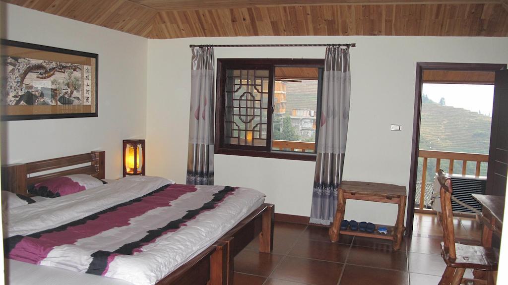 Longji Holiday Hotel Longsheng Room photo