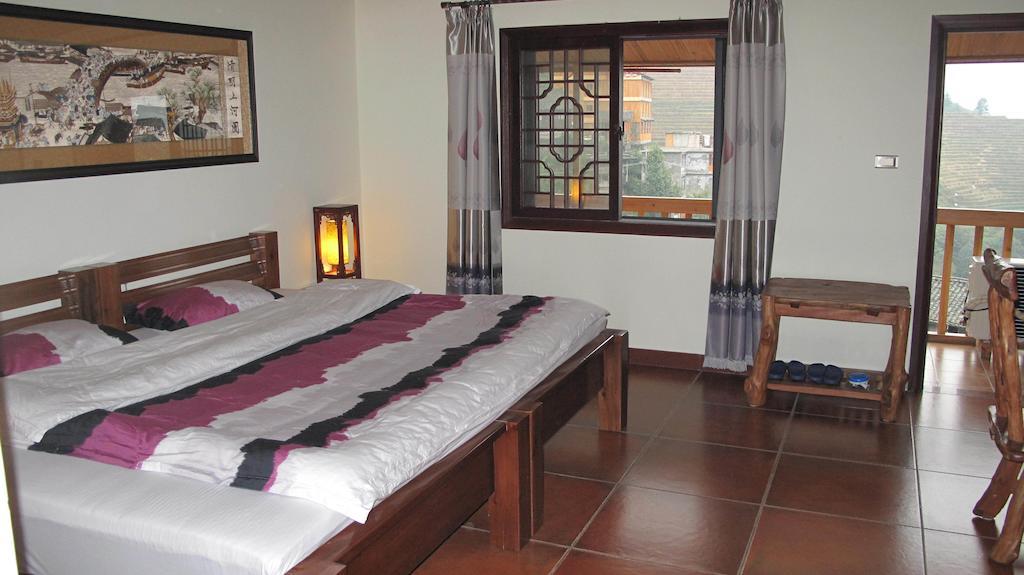 Longji Holiday Hotel Longsheng Room photo