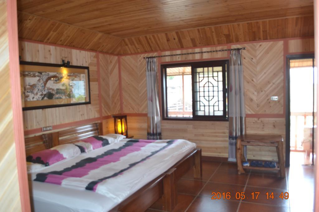 Longji Holiday Hotel Longsheng Room photo